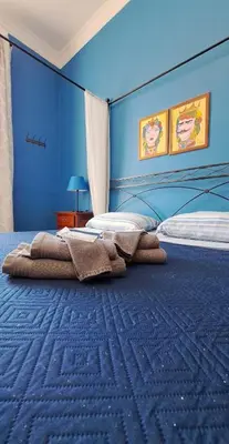 Letto o letti in una camera di Stella del Sud