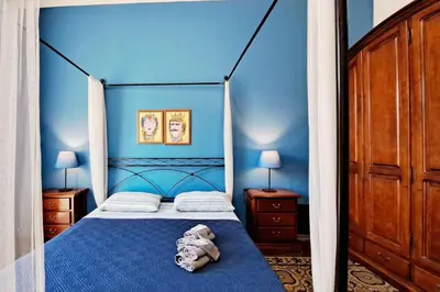 Letto o letti in una camera di Stella del Sud