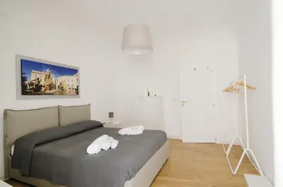 Letto o letti in una camera di La terrazza di Archimede- Ortigia Holidays