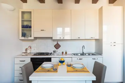 Cucina o angolo cottura di Aretusa Apartments by Wonderful Italy