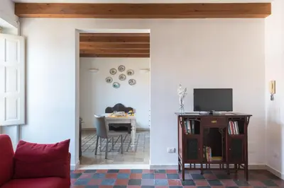 TV o dispositivi per l'intrattenimento presso Aretusa Apartments by Wonderful Italy