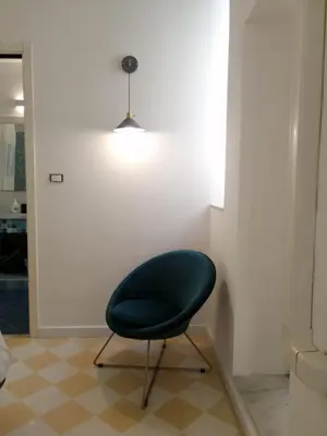 Area soggiorno di Antico Mercato Ortigia Apartment