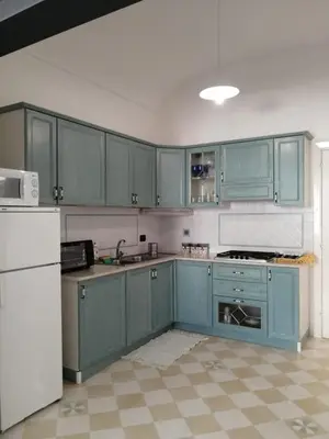 Cucina o angolo cottura di Antico Mercato Ortigia Apartment