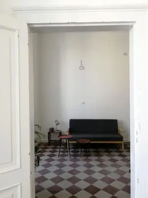 Area soggiorno di Antico Mercato Ortigia Apartment