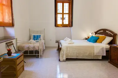 Letto o letti in una camera di Il Cortile della Giara