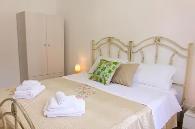 Letto o letti in una camera di Il Cortile della Giara