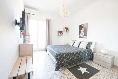 Letto o letti in una camera di Casa Vacanze La Meridiana
