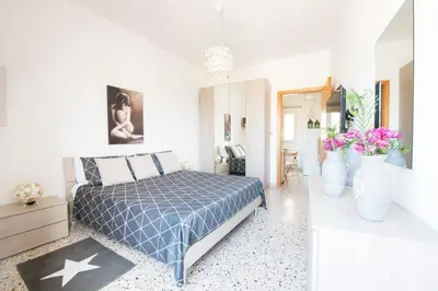 Letto o letti in una camera di Casa Vacanze La Meridiana