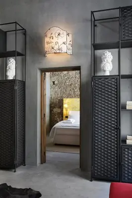 Letto o letti in una camera di ISONZO SUITES