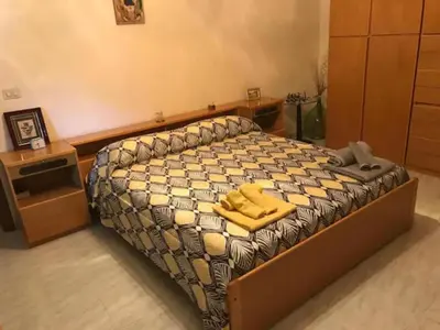 Letto o letti in una camera di Villa Luce