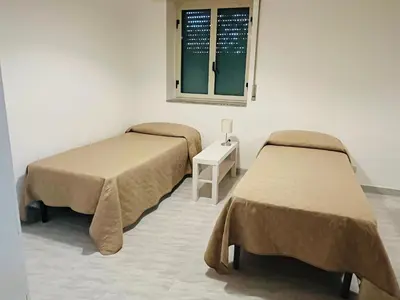 Letto o letti in una camera di Villa Luce