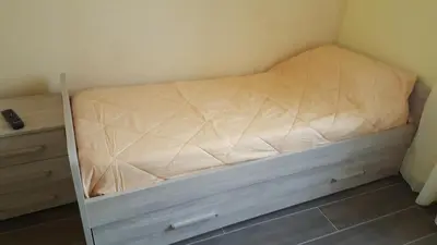 Letto o letti in una camera di DIMORA SANTA LUCIA 2.0
