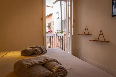 Letto o letti in una camera di La Palazzata