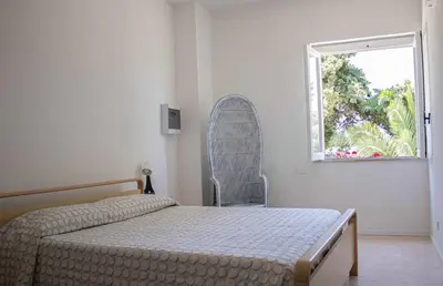 Letto o letti in una camera di San basilio guest house