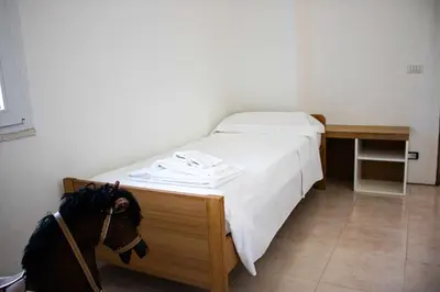Letto o letti in una camera di San basilio guest house