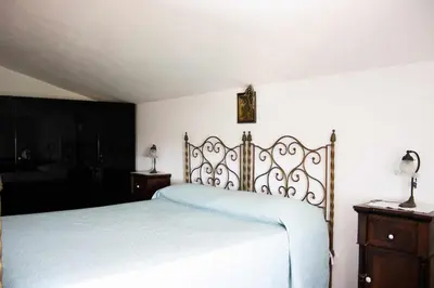 Letto o letti in una camera di San basilio guest house