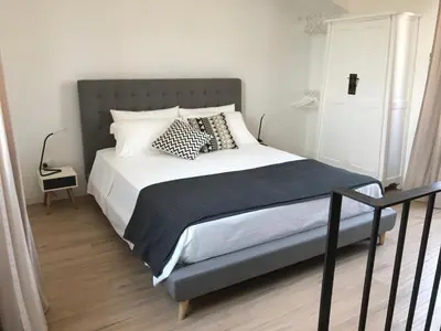 Letto o letti in una camera di TOREMARE SUITE MARZAMEMI