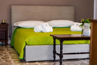 Letto o letti in una camera di Le Gorgoni b&b