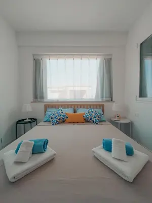 Letto o letti in una camera di Misalmar - Appartamenti San Lorenzo 1