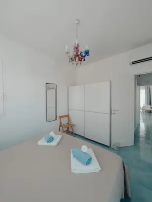 Letto o letti in una camera di Misalmar - Appartamenti San Lorenzo 1