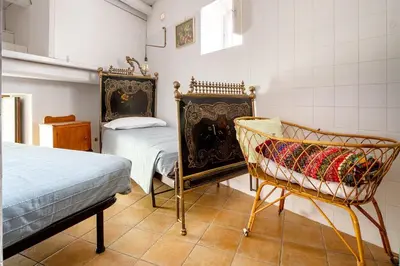 Letto o letti in una camera di Ziolì Vintage Apartment