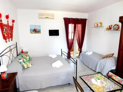 Letto o letti in una camera di Sicilia Room