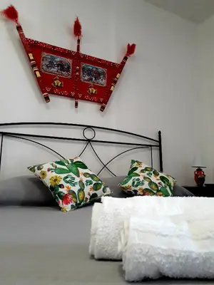 Letto o letti in una camera di Sicilia Room