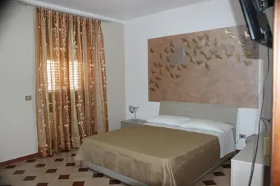 Letto o letti in una camera di Il Girasole