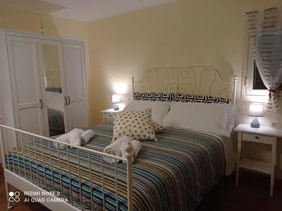 Letto o letti in una camera di Balconcino sugli Ulivi