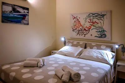 Letto o letti in una camera di Balconcino sugli Ulivi