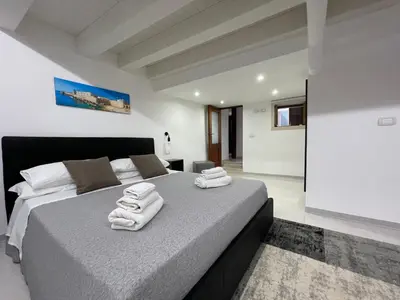 Letto o letti in una camera di Appartamento Maniace