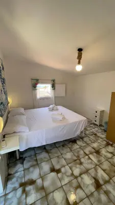 Letto o letti in una camera di La Torretta di Ognina
