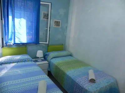 Letto o letti in una camera di L'ULIVO Marzamemi