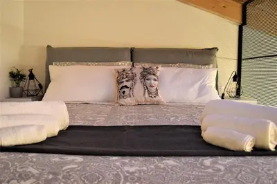 Letto o letti in una camera di Il Limone Holiday Home Siracusa