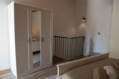 Letto o letti in una camera di Qui ed Ora,Guest house.