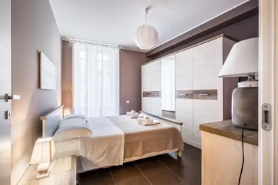 Letto o letti in una camera di Modica for Family - Rooms and Apartments