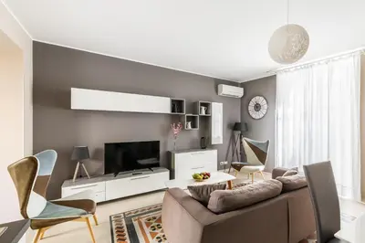 TV o dispositivi per l'intrattenimento presso Modica for Family - Rooms and Apartments