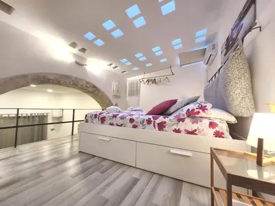Letto o letti in una camera di La casetta di Ciuzza