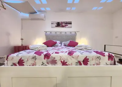 Letto o letti in una camera di La casetta di Ciuzza