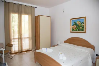 Letto o letti in una camera di VILLA VEGA
