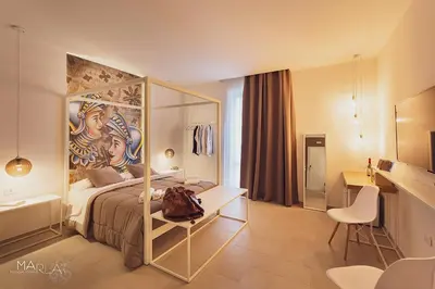 Letto o letti in una camera di Marla's boutique rooms