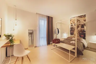 Letto o letti in una camera di Marla's boutique rooms