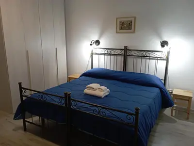Letto o letti in una camera di Casa vacanze Porta Garibaldi