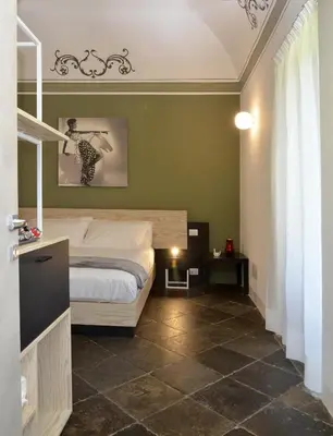 Letto o letti in una camera di Regia Trazzera