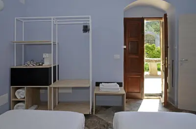 Letto o letti in una camera di Regia Trazzera