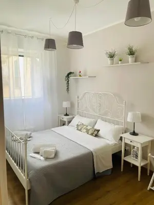 Letto o letti in una camera di Lùrooms- Guesthouse in Noto