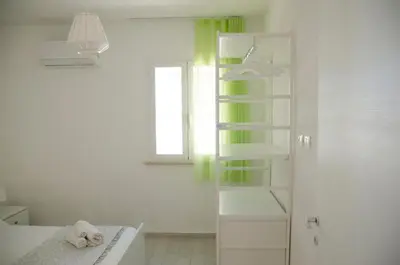 Letto o letti in una camera di Almaga Apartments - San Lorenzo, Marzamemi