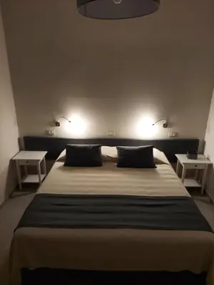 Letto o letti in una camera di Papiroom's