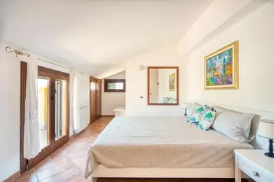 Letto o letti in una camera di Villa Anbegia