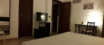 Letto o letti in una camera di Fontanarossa Airport Home